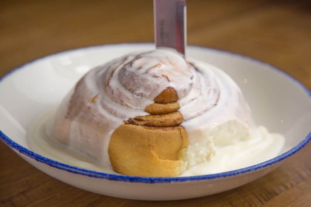 cinnamon roll covered in icing